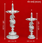 प्रीमियम सफ़ेद मेटल मोर समाई दीया पेयर | मंदिर के लिए 5 ज्योति वाला स्टैंडिंग तेल का दीपक